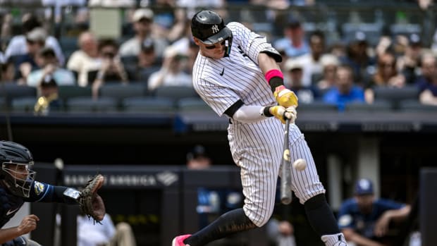 May 13, 2023; Bronx, New York, USA; New York Yankees center fielder Aaron Judge (99) hits a two-run home run against the Tampa Bay Rays during the fifth inning at Yankee Stadium.